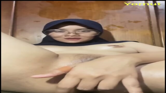 This beautiful girl in hijab is masturbating until she squirts multiple times